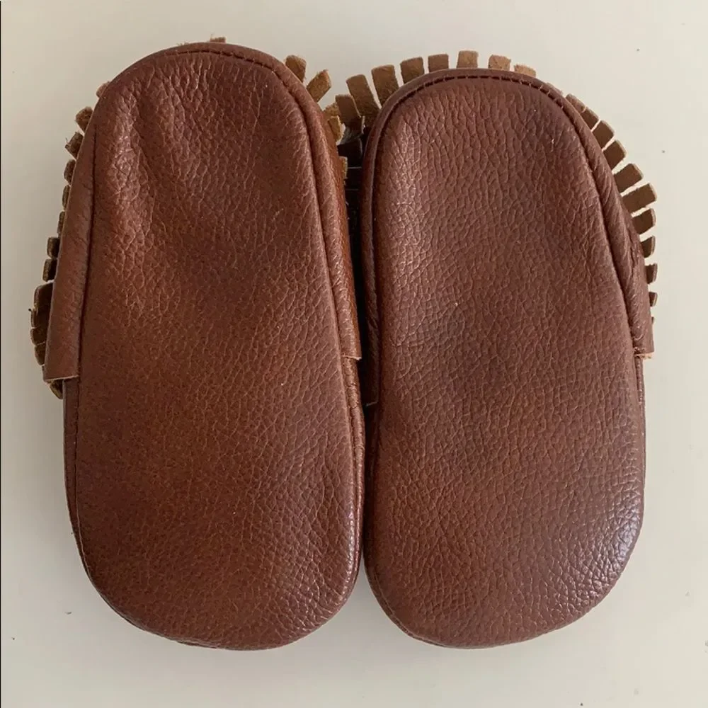 NWOT Brown fringe baby leather moccasins-XL